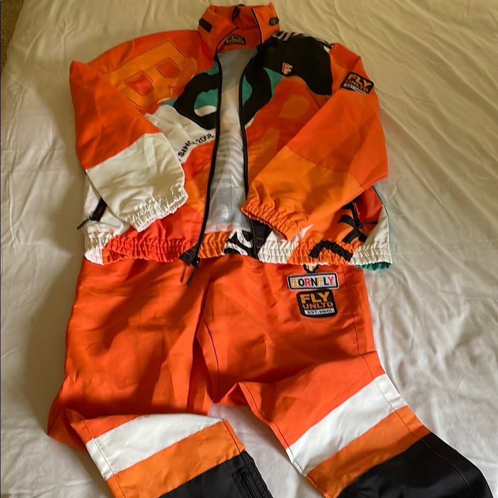 Orange and black jogging suit